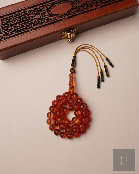 زعفراني شبيه كهرب الشفاف فواح